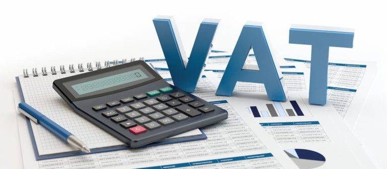 VAT, calculator, and paperwork